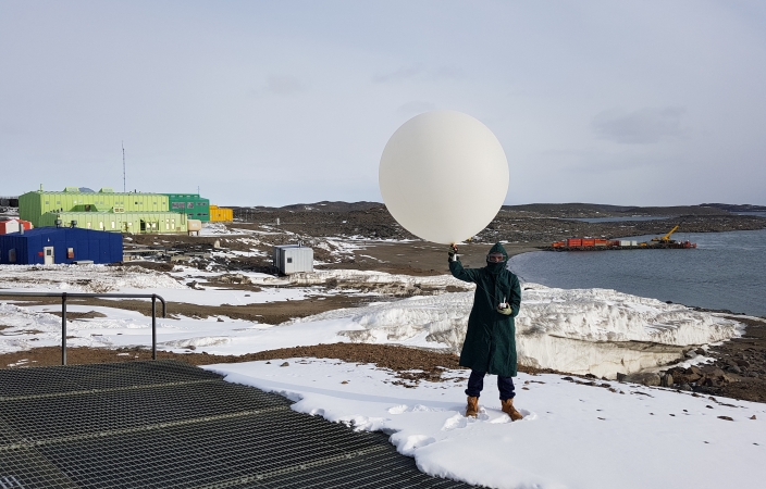 Rob launching weather balloons at Davis Station Antarctica